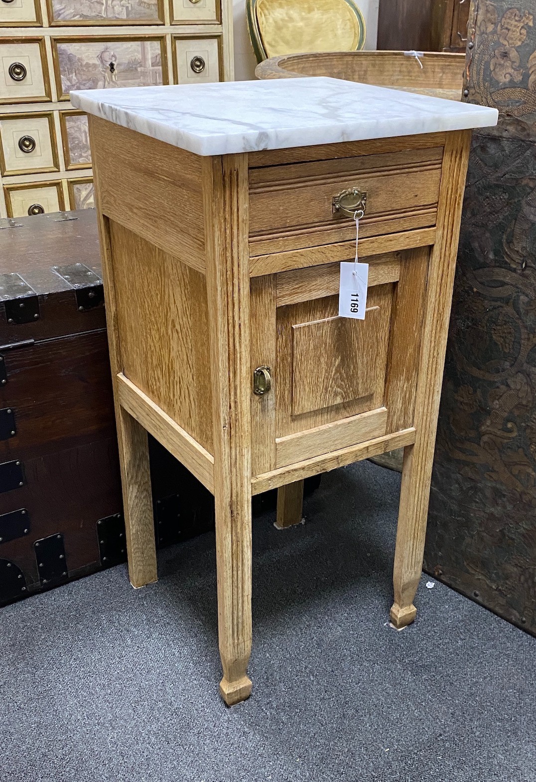An early 20th century Continental oak marble top bedside cabinet, width 42cm, depth 39cm, height 85cm